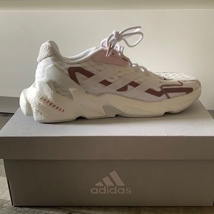 White Running Adidas shoes with pink details. Very supportive and comfortable